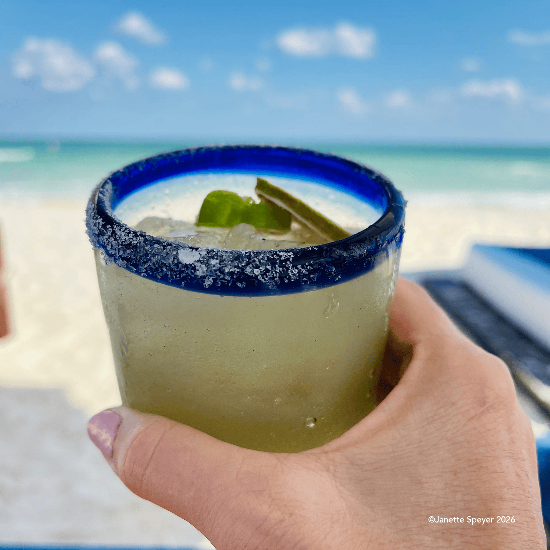 Cinco Margarita with salt rim in a traditional Mexican glass
