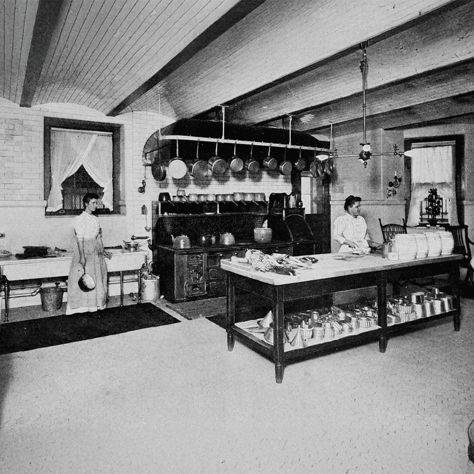 Gilded Age Kitchen - A-Cook-and-Second-Cook-in-a-model-kitchen,-from-Mrs.-Seely's-Cook-Book-(1902).-NPS-Photo