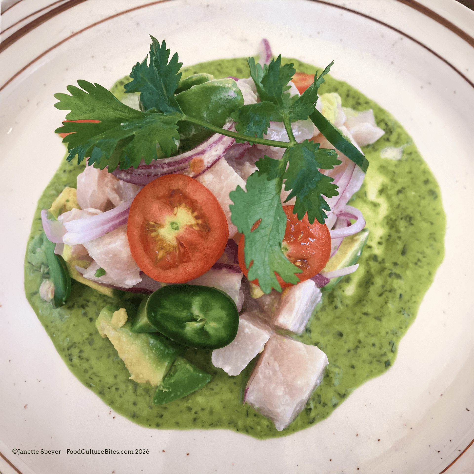 A Ceviche Dish With Lime Sauce And Jalapeños